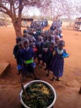 children waiting for kale from our school garden