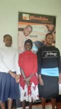The first from left is Magreth, Agape and Rehema