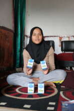 Photo of Tata receiving herbal medicine assistance