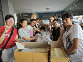 Packing the Bags for Christmas Outreach