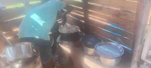 A local hotel owner uses a local cook stove