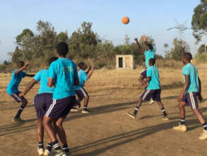 Practicing basketball