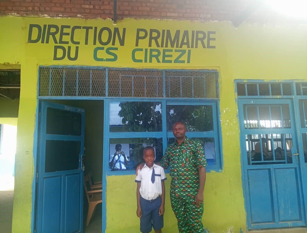 Visits children at their schools