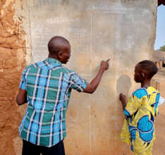 Tutor and student work on math problems