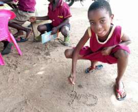 Adaklu Dawanu students learning to read