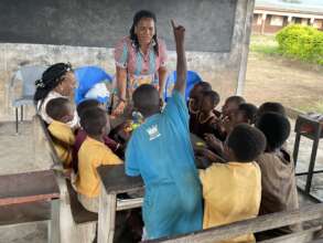 Stella with Kindergarten & 1st graders.