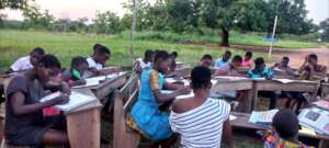 Students write letters to their sponsors.