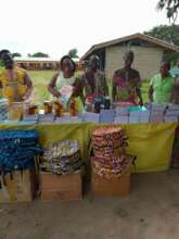 Stella and helpers passing out school supplies.