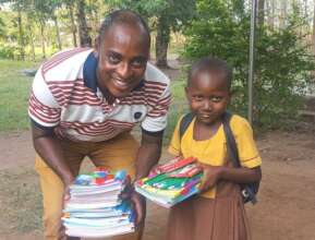 2nd year Kindergartener Afeafa and her headmaster