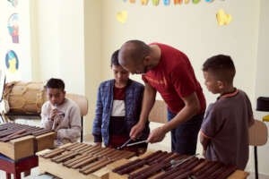 Carlos, our music teacher, teaching