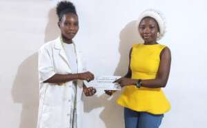 Melody receiving her fund.