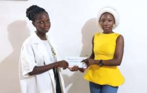 Patience receiving her fund.