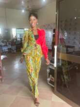 Dress made by graduate.