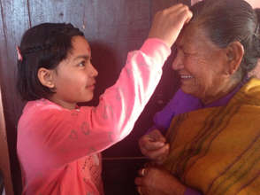 Anita gives her new Grandmother a Tika*