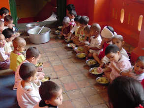Toddlers lined up for meals