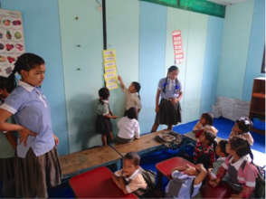 Anita Assisting in Nursery class