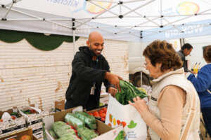 Distributing fresh produce to residents