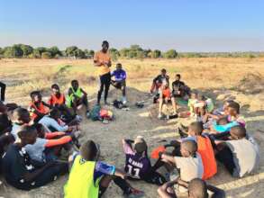 Coaching Boys Into Men session with young athletes