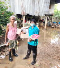 Trudging through mud and water to reach the needy