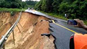 Road cut off due to heavily drenched soil