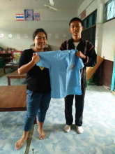 Dou receiving his uniform