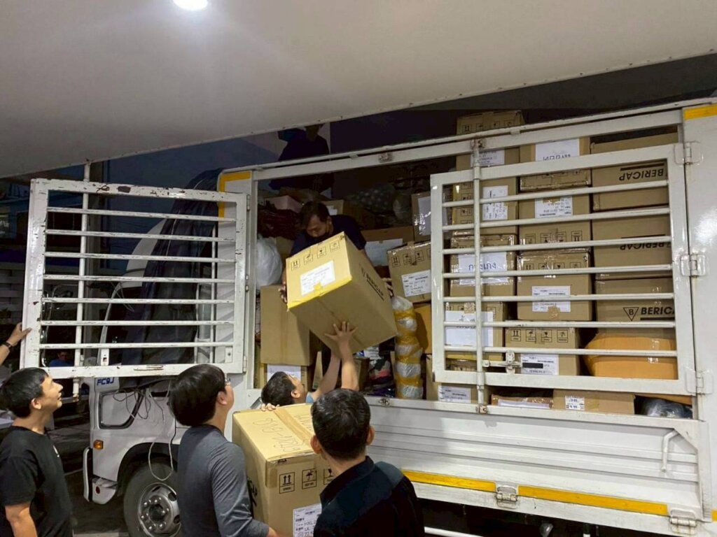 Team loading relief goods for survivors.