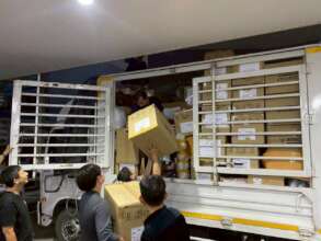 Team loading relief goods for survivors.