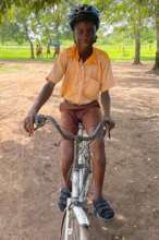 Adaklu student with helmet
