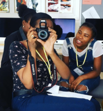 Global girls learn to use high-tech equipment.