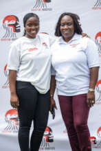 Beneficiary Esther pose with mother