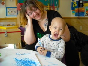 Mom + child creating art together
