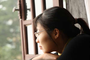 Thuy looks out at her new life