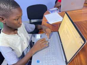 A student using a computer at the Good Life Center