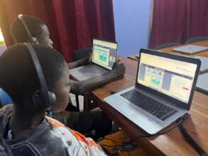 Christabel & Sampson in on-line Canva class.