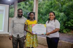 Enyonam receiving her Girls Who Code certificate