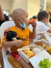 Children have a meal together