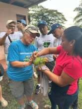 Dr. Joyner examining a parrot in Nicaragua.