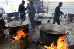 Anera team cooking in Gaza