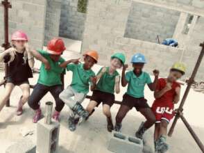 Our children learning brick laying