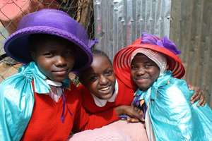 The Kibera LitClub plays dress-up in new costumes