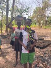 Young girls planting trees