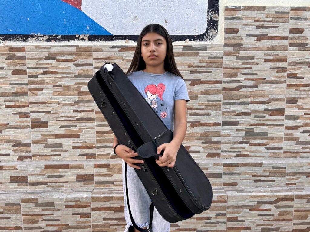 Help 164 children get cases for their instruments