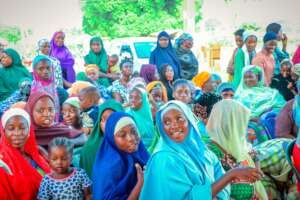 Beneficiaries awaiting gifts of sanitary pads