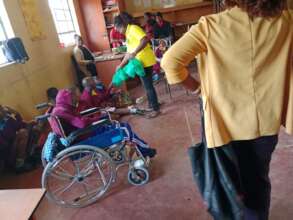 Maureen distributing the dignity packs