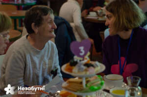Volunteer and a guest with dementia