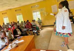 A Health Worker training VHCTs on Family Planning