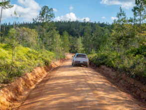 Low vehicle on access road