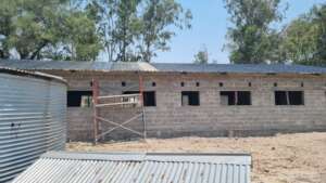 Exterior view of building with the added roof