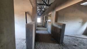 Central corridor view showing doors to side rooms