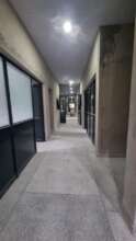 Main corridor of the new lab showing Terrazo floor